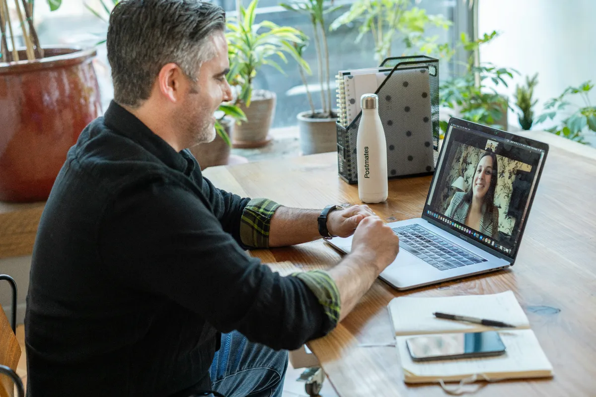 Professional conducting an online tech demo video call